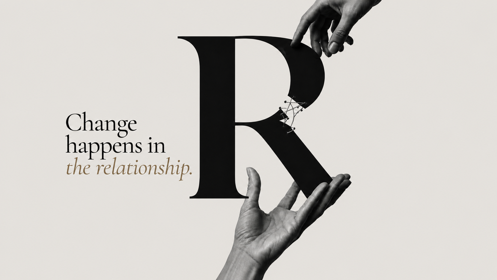 Change happens in the relationship, two hands passing a serif letter R stitched back together.