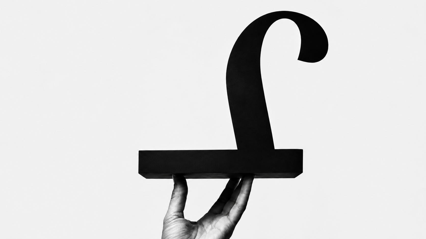 A large serif pound sign held aloft on an upturned hand