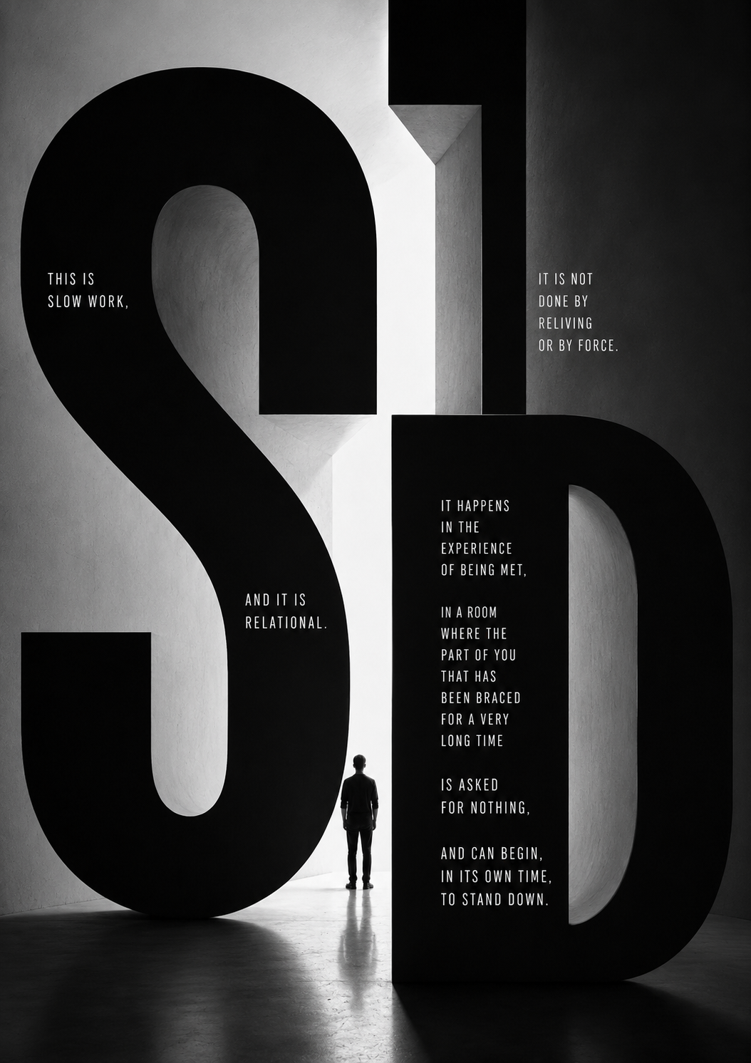A lone figure stands between two monumental letters S and D in a vast concrete hall, the walls printed with the words 'this is slow work, and it is relational… the part of you that has been braced for a very long time is asked for nothing, and can begin, in its own time, to stand down.'